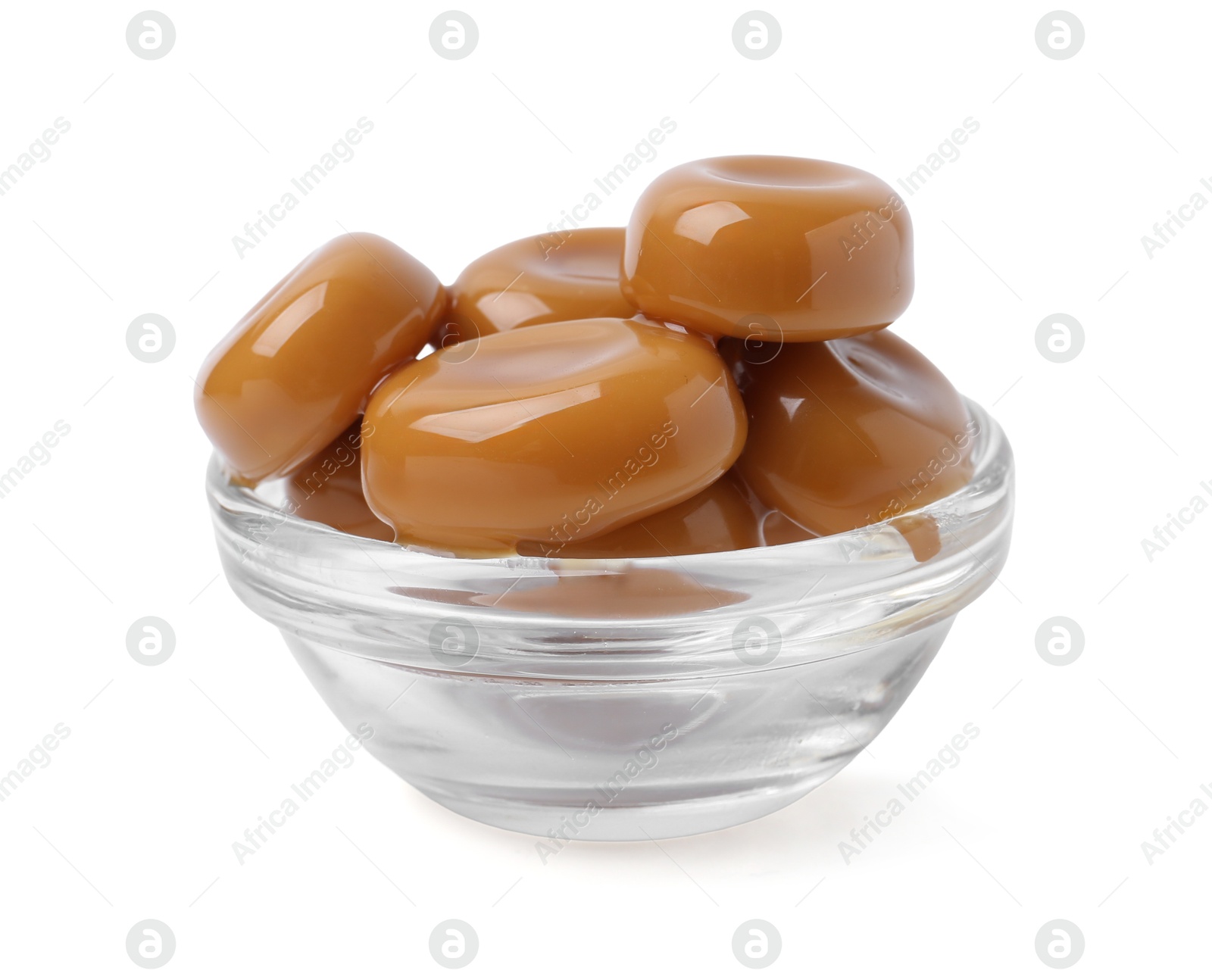 Tasty sweet caramel candies isolated on white Photo of Tasty sweet caramel candies isolated on white