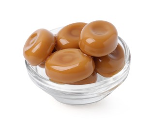 Photo of Tasty sweet caramel candies isolated on white