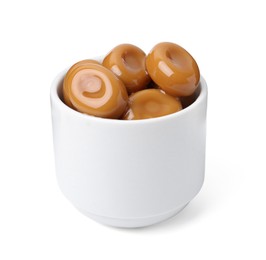 Photo of Tasty sweet caramel candies isolated on white