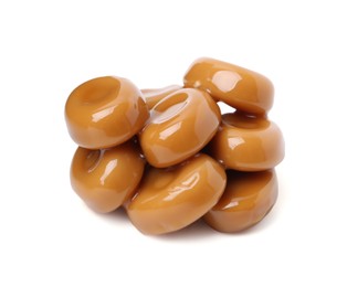 Photo of Tasty sweet caramel candies isolated on white