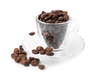 Photo of Aromatic coffee beans in cup and saucer isolated on white