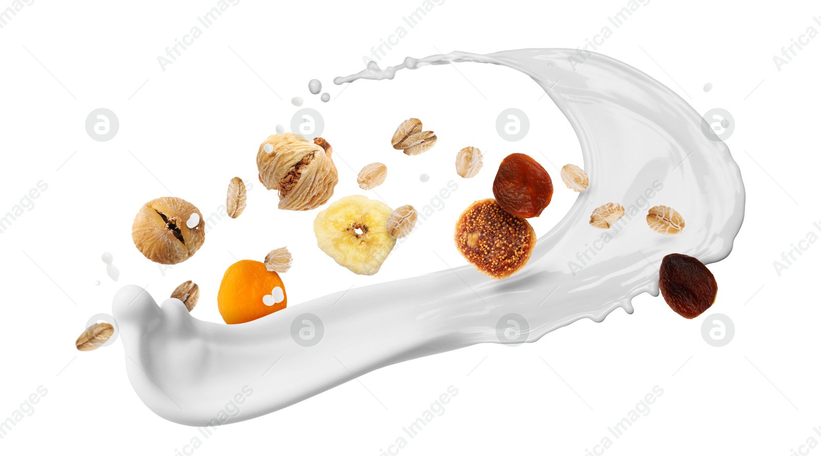 Milk splash with oat flakes and dried fruits in air on white background. Healthy breakfast Image of Milk splash with oat flakes and dried fruits in air on white background. Healthy breakfast