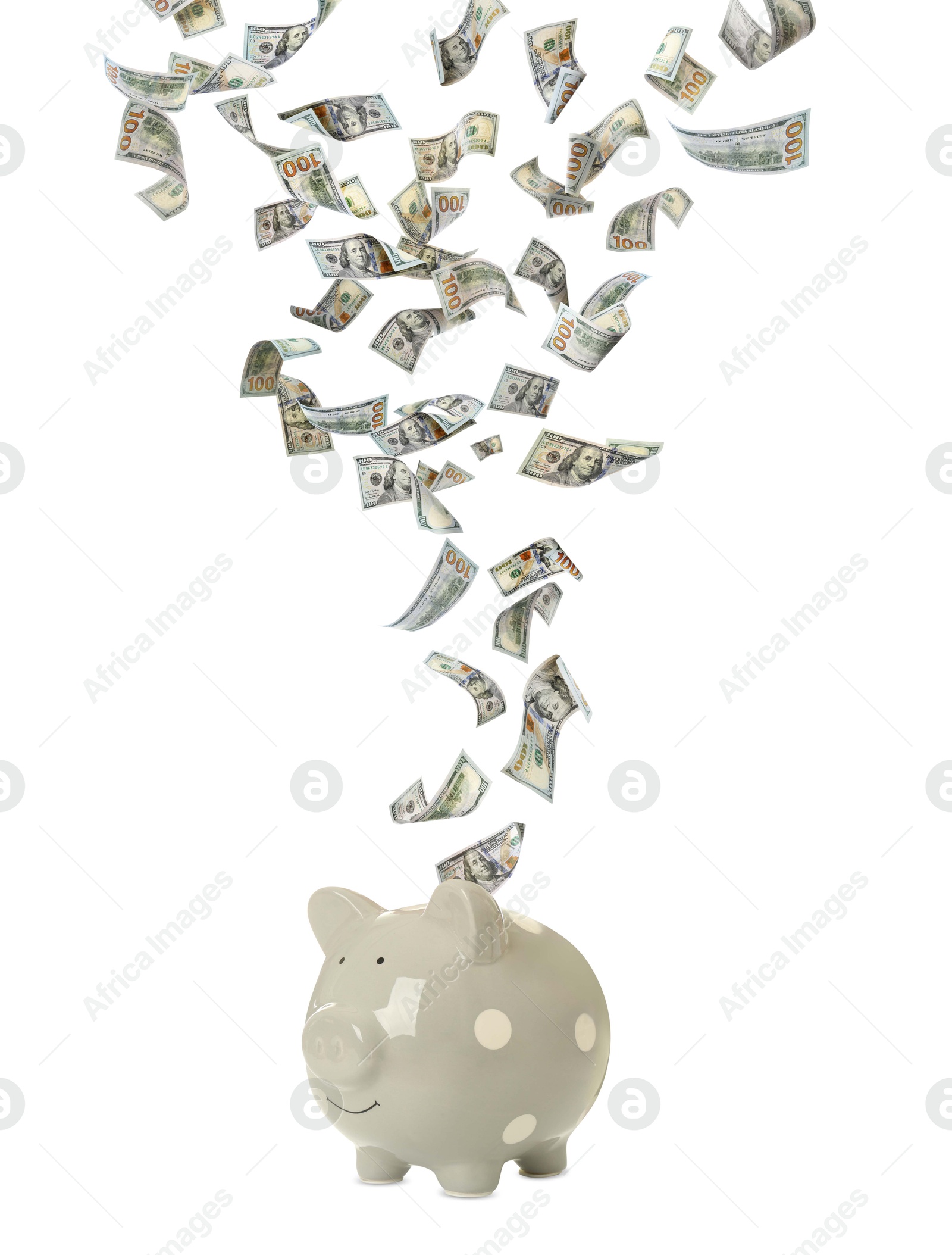 Dollar bills falling into piggy bank on white background Image of Dollar bills falling into piggy bank on white background