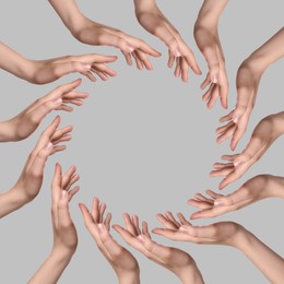 Image of Making circle of human hands on grey background. Unity, partnership, cooperation