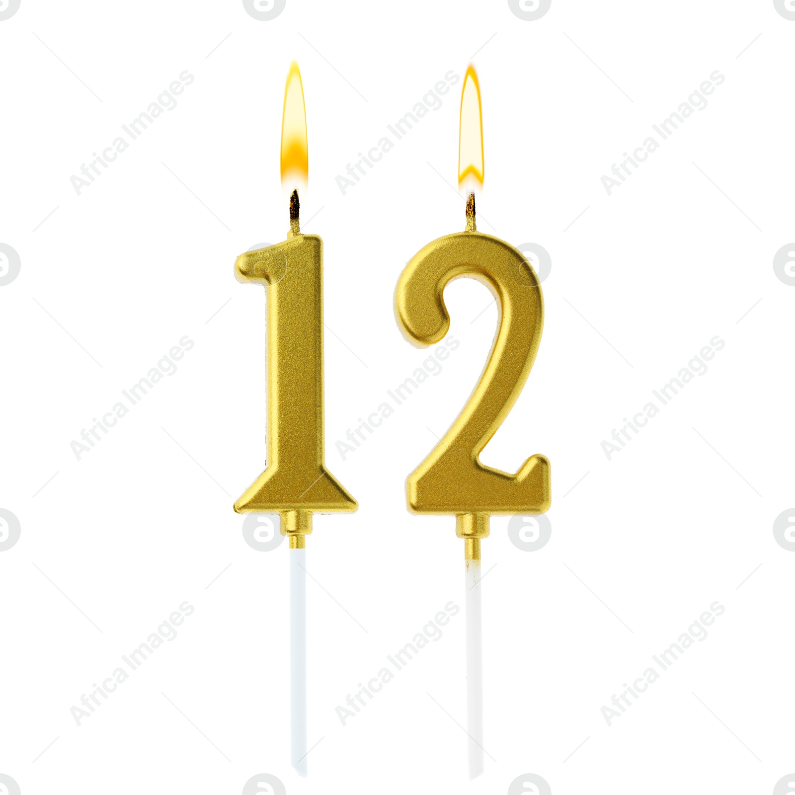 Burning golden cake candles composing number 12 on white background. Festive decoration for birthday or other special date Image of Burning golden cake candles composing number 12 on white background. Festive decoration for birthday or other special date