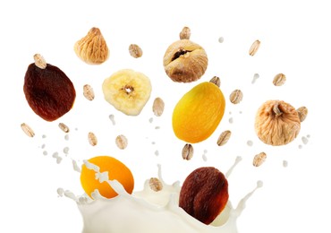 Image of Milk splash with oat flakes and dried fruits in air on white background. Healthy breakfast