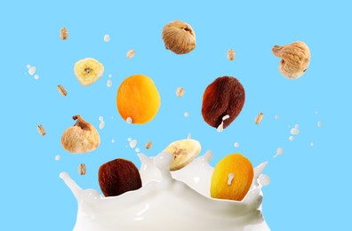 Image of Milk splash with oat flakes and dried fruits in air on light blue background