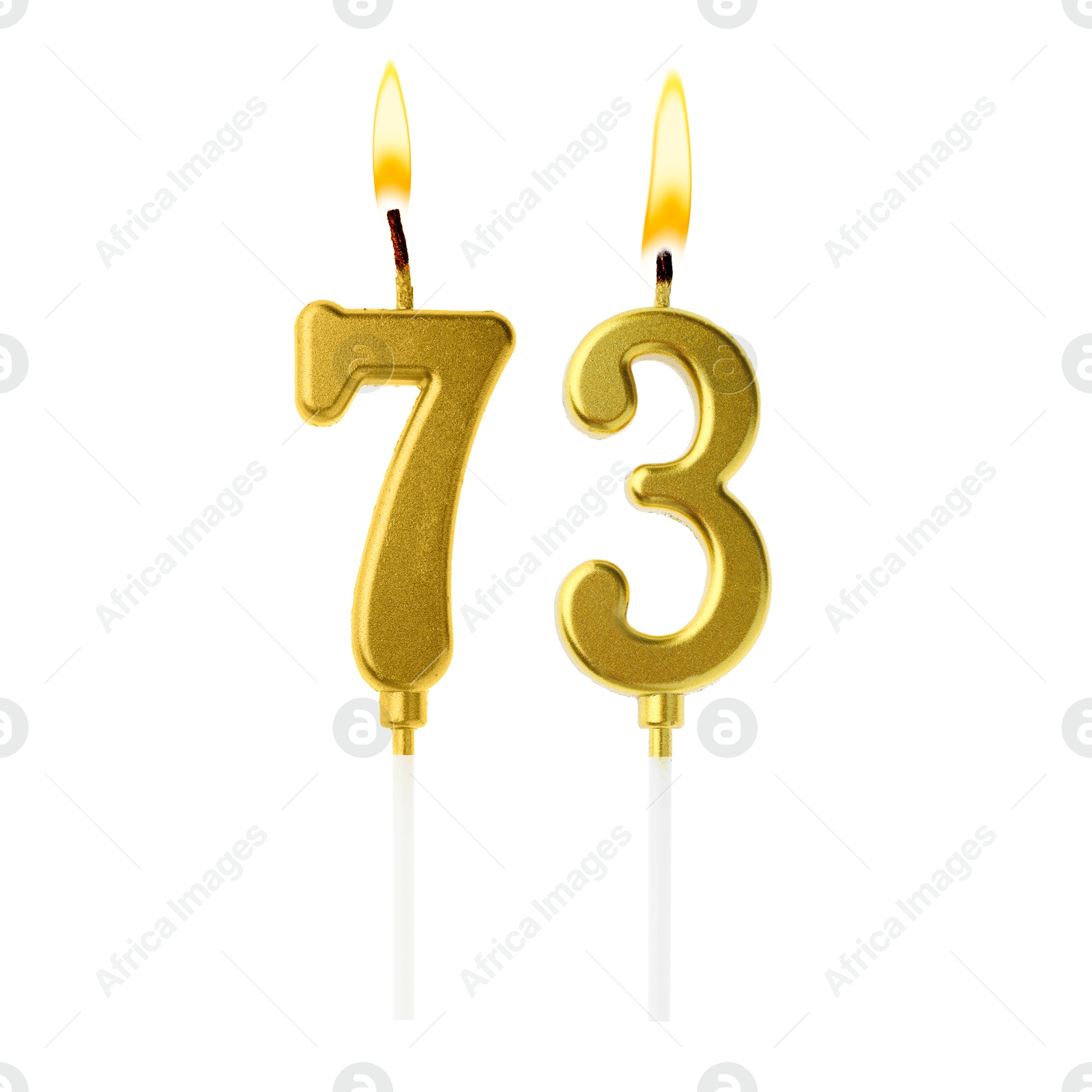 Burning golden cake candles composing number 73 on white background. Festive decoration for birthday or other special date Image of Burning golden cake candles composing number 73 on white background. Festive decoration for birthday or other special date