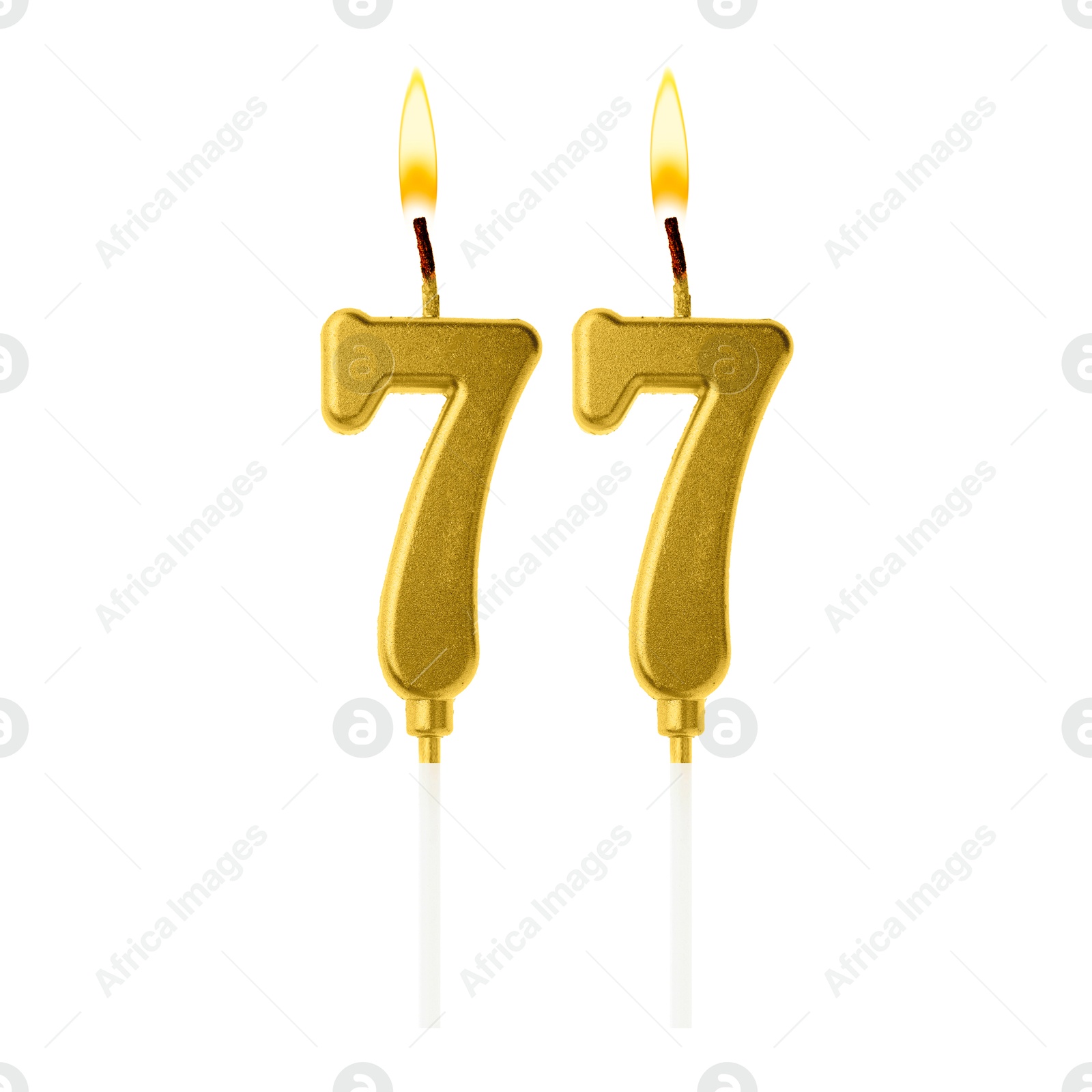 Burning golden cake candles composing number 77 on white background. Festive decoration for birthday or other special date Image of Burning golden cake candles composing number 77 on white background. Festive decoration for birthday or other special date