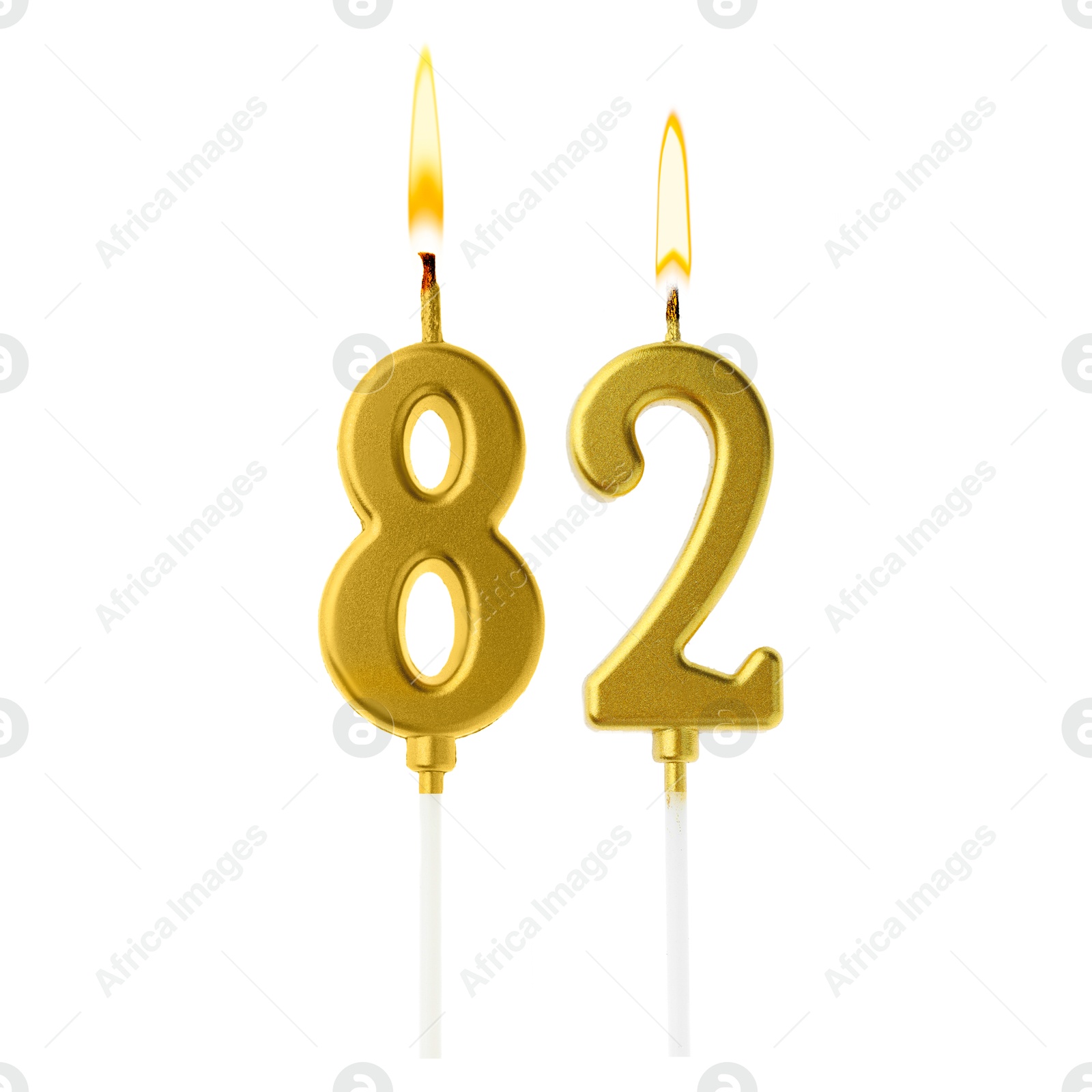 Burning golden cake candles composing number 82 on white background. Festive decoration for birthday or other special date Image of Burning golden cake candles composing number 82 on white background. Festive decoration for birthday or other special date