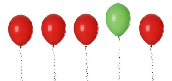 Image of Individuality, uniqueness, different. Green balloon among red ones on white background