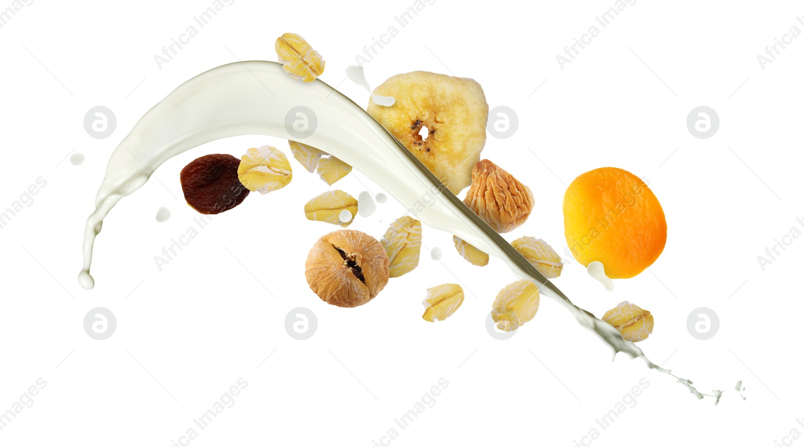 Milk splash with oat flakes and dried fruits on white background. Healthy breakfast Image of Milk splash with oat flakes and dried fruits on white background. Healthy breakfast