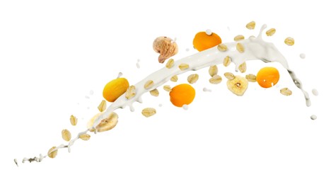 Image of Milk splash with oat flakes and dried fruits in air on white background. Healthy breakfast