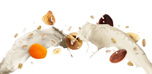 Image of Milk splash with oat flakes and dried fruits in air on white background. Healthy breakfast