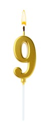 Image of Golden cake candle in shape of number 9 burning on white background. Festive decoration for birthday or other special date