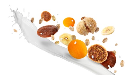 Image of Milk splash with oat flakes and dried fruits in air on white background. Healthy breakfast