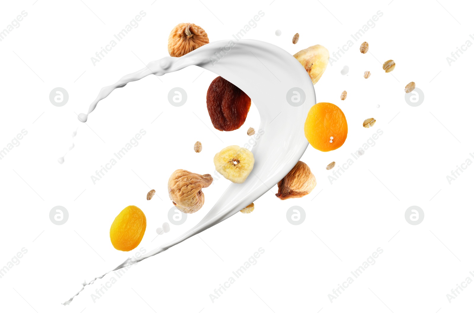Milk splash with oat flakes and dried fruits in air on white background. Healthy breakfast Image of Milk splash with oat flakes and dried fruits in air on white background. Healthy breakfast