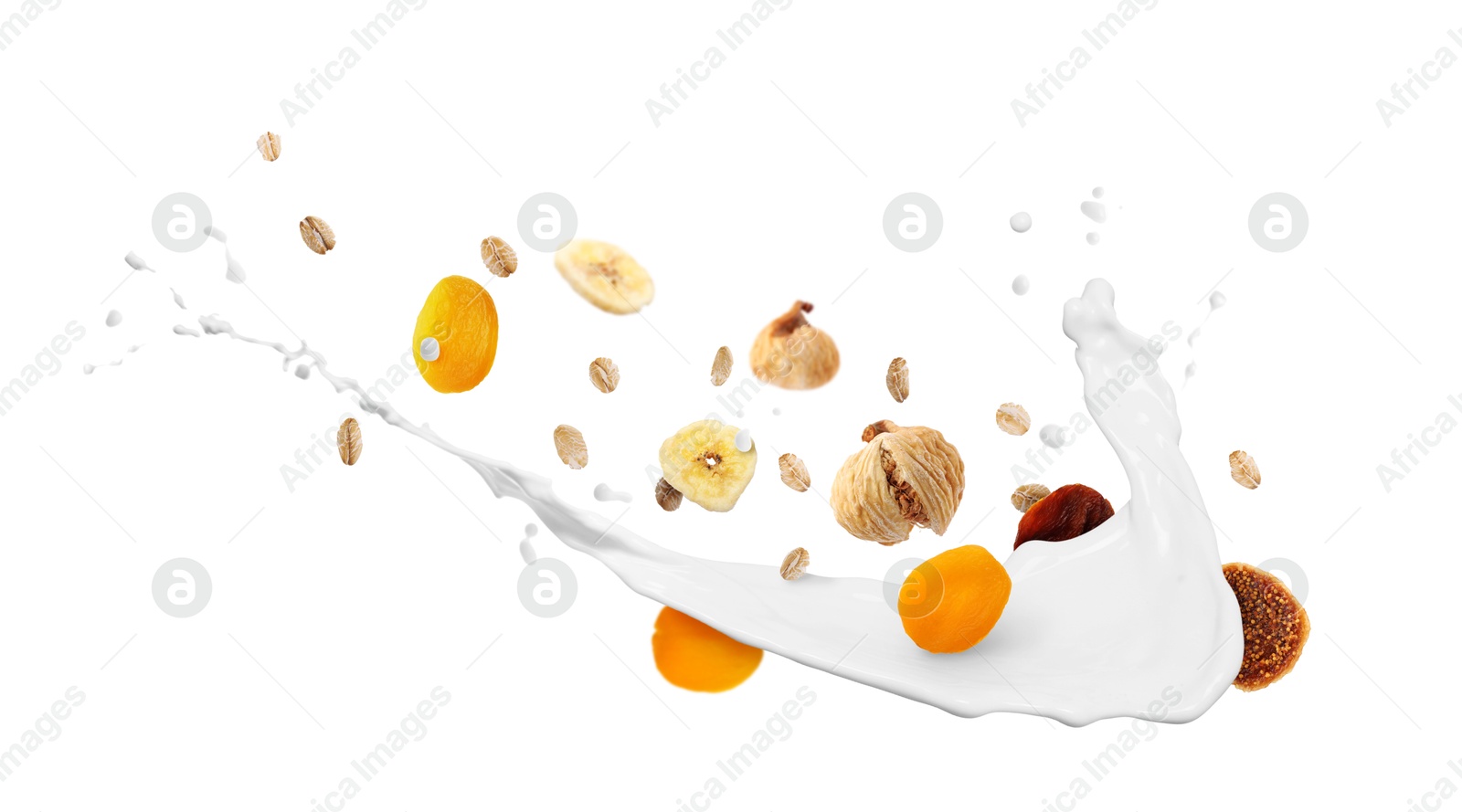 Milk splash with oat flakes and dried fruits in air on white background. Healthy breakfast Image of Milk splash with oat flakes and dried fruits in air on white background. Healthy breakfast