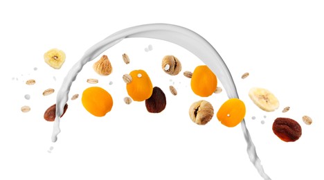 Image of Milk splash with oat flakes and dried fruits in air on white background. Healthy breakfast