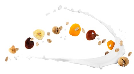 Image of Milk splash with oat flakes and dried fruits in air on white background. Healthy breakfast