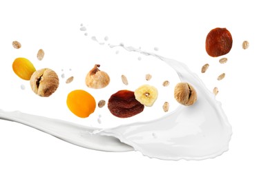 Image of Milk splash with oat flakes and dried fruits in air on white background. Healthy breakfast