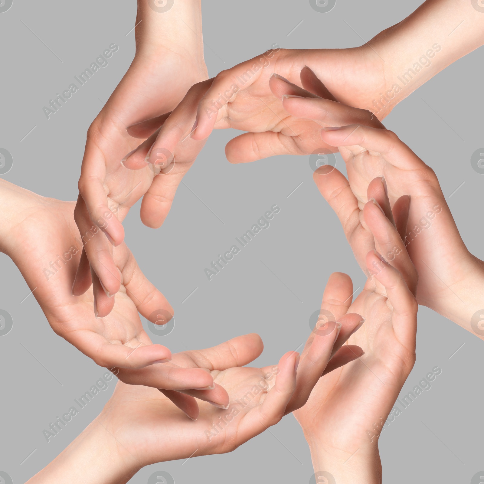 Making circle of human hands on grey background. Unity, partnership, cooperation Image of Making circle of human hands on grey background. Unity, partnership, cooperation