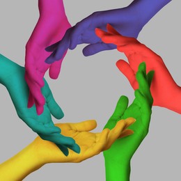 Image of Making circle of human hands painted in different colors on grey background. Unity, partnership, cooperation