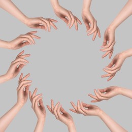Image of Making circle of human hands on grey background. Unity, partnership, cooperation