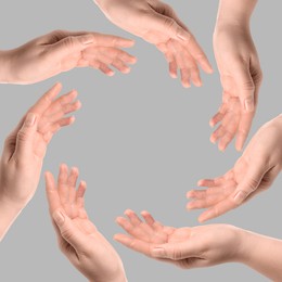 Image of Making circle of human hands on grey background. Unity, partnership, cooperation