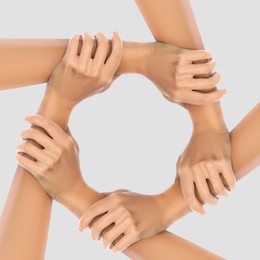 Image of Making circle of human hands on grey background. Unity, partnership, cooperation