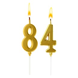 Image of Burning golden cake candles composing number 84 on white background. Festive decoration for birthday or other special date