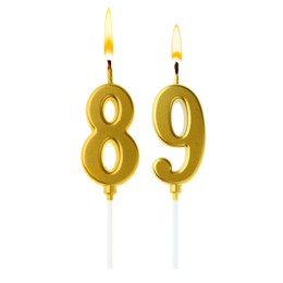 Image of Burning golden cake candles composing number 89 on white background. Festive decoration for birthday or other special date