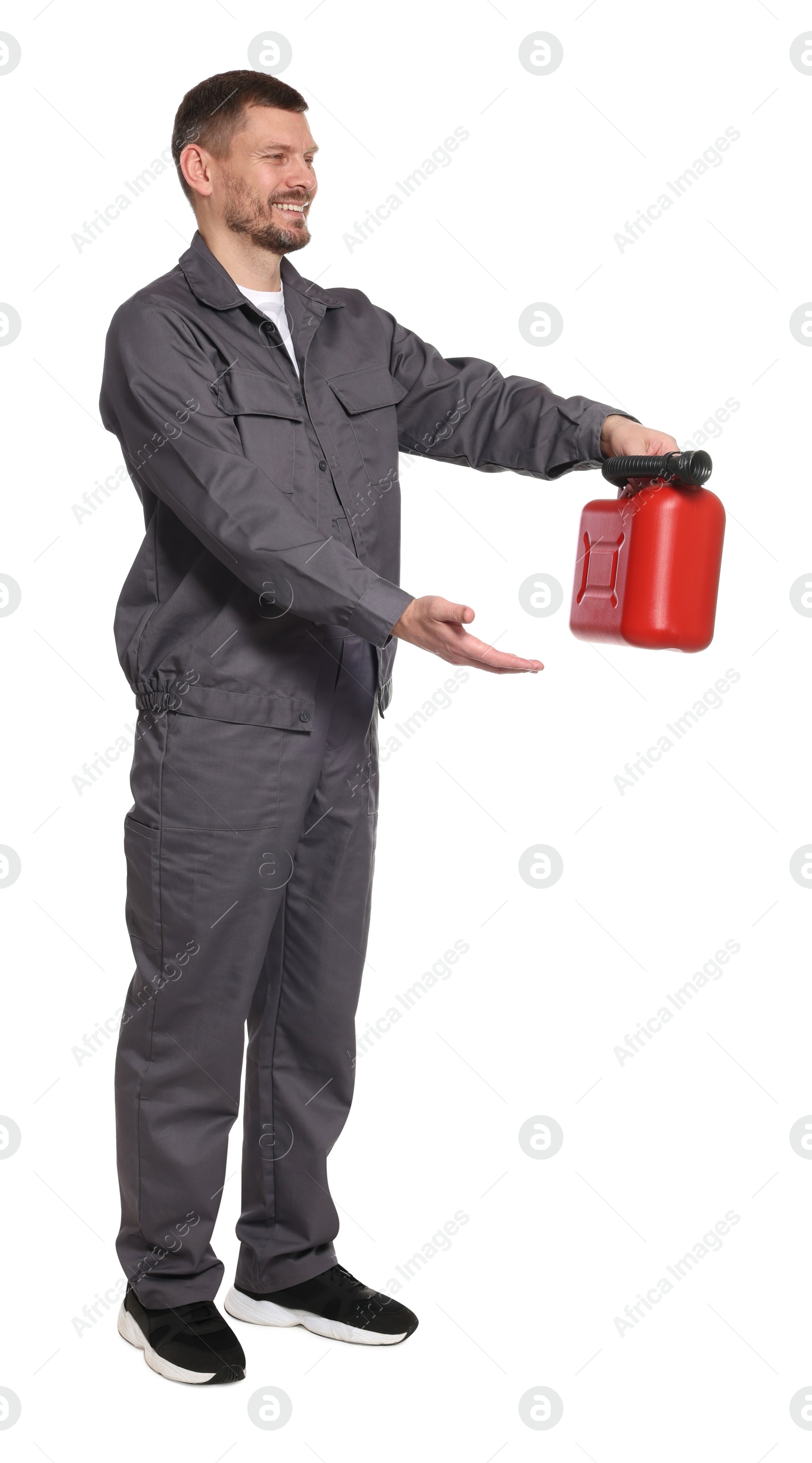 Man holding plastic canister on white background Photo of Man holding plastic canister on white background