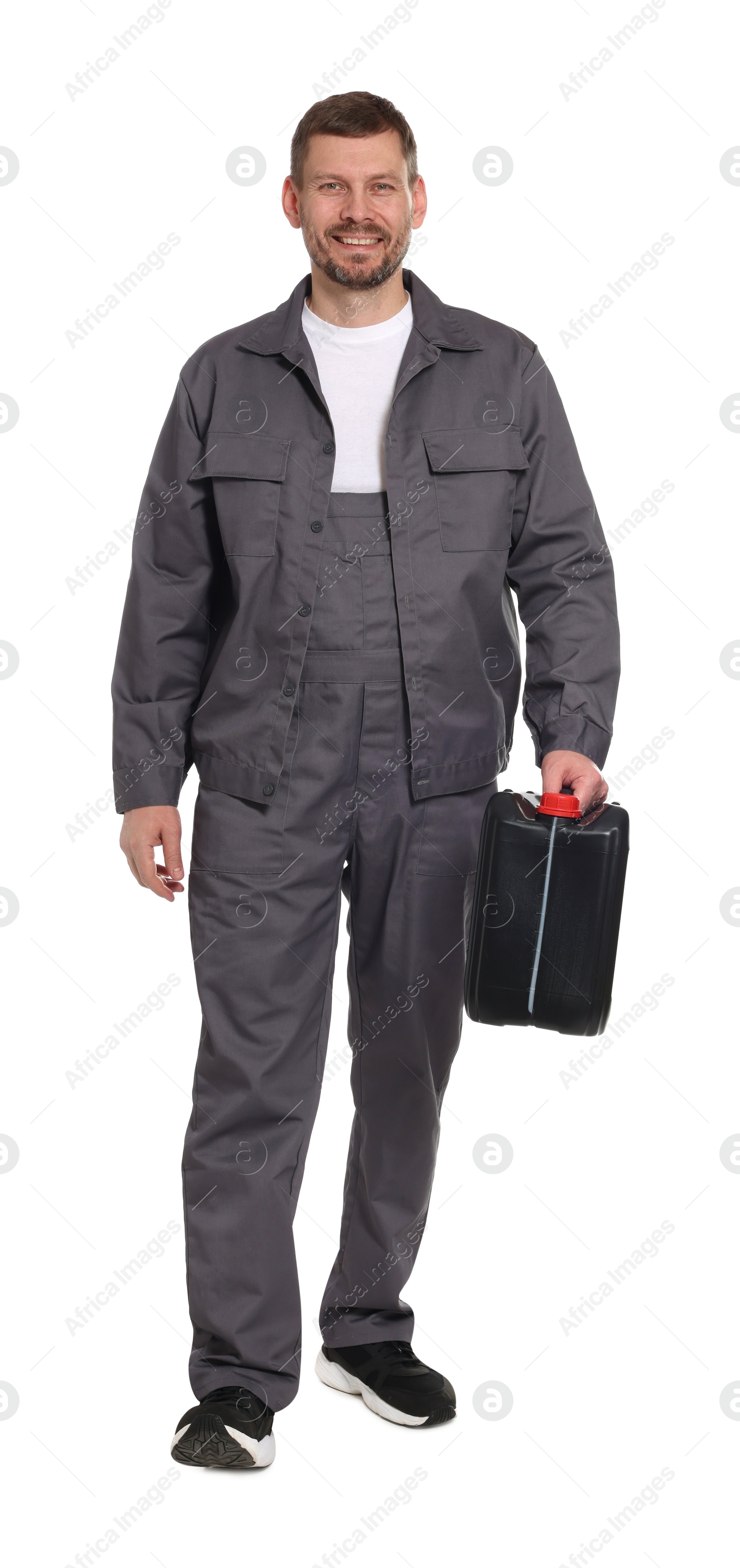 Man holding plastic canister on white background Photo of Man holding plastic canister on white background