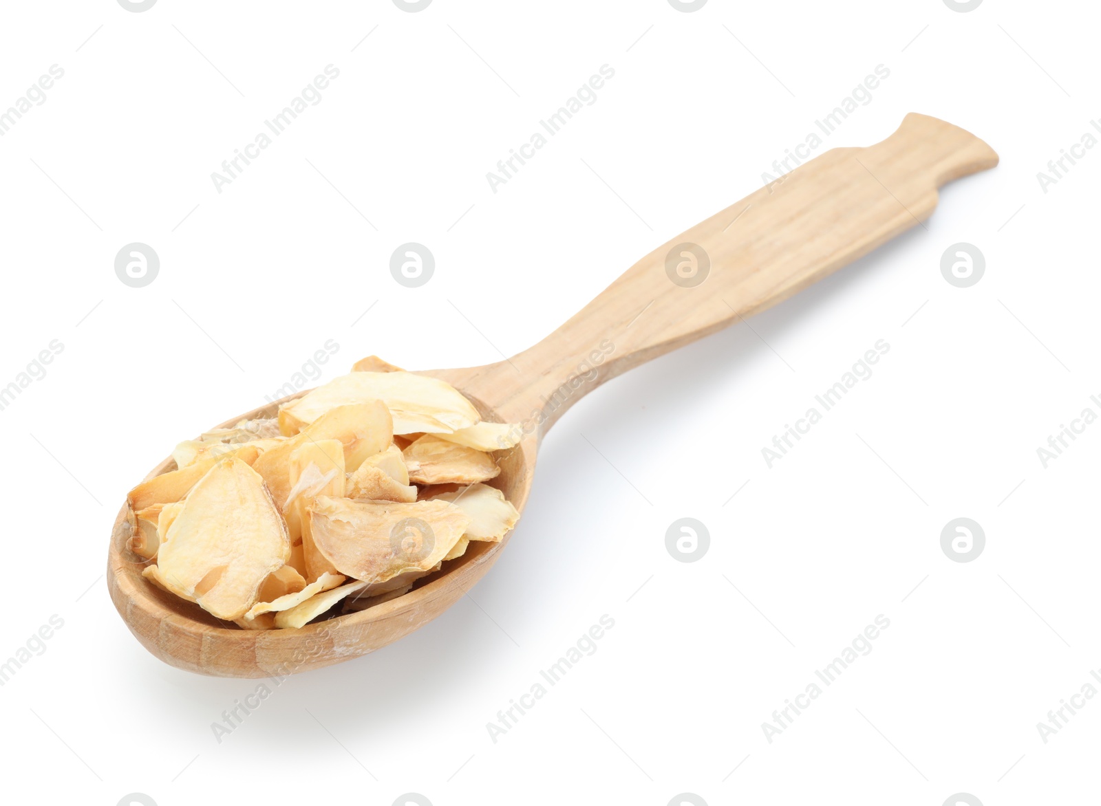 Dried garlic in wooden spoon isolated on white Photo of Dried garlic in wooden spoon isolated on white