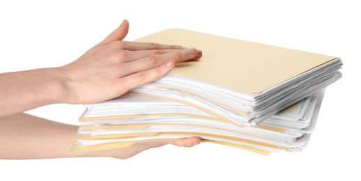 Photo of Woman holding stack of file folders with papers on white background, closeup