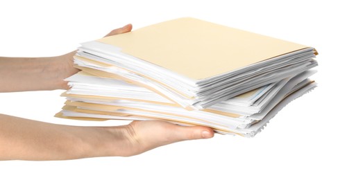 Photo of Woman holding stack of file folders with papers on white background, closeup