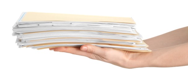 Photo of Woman holding stack of file folders with papers on white background, closeup