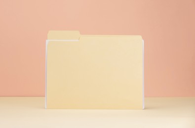 Photo of One paper file folder on color background