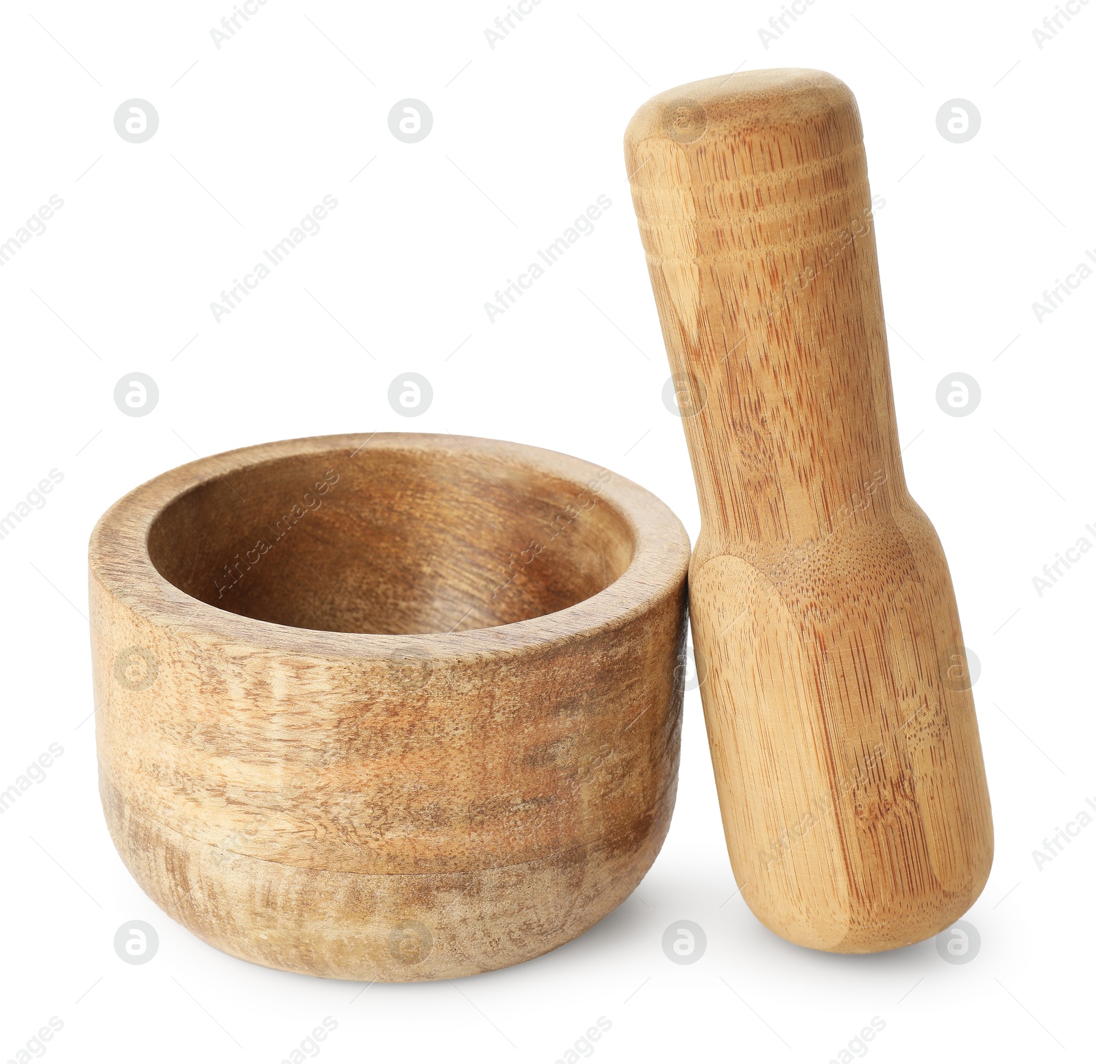 Wooden mortar with pestle isolated on white Photo of Wooden mortar with pestle isolated on white