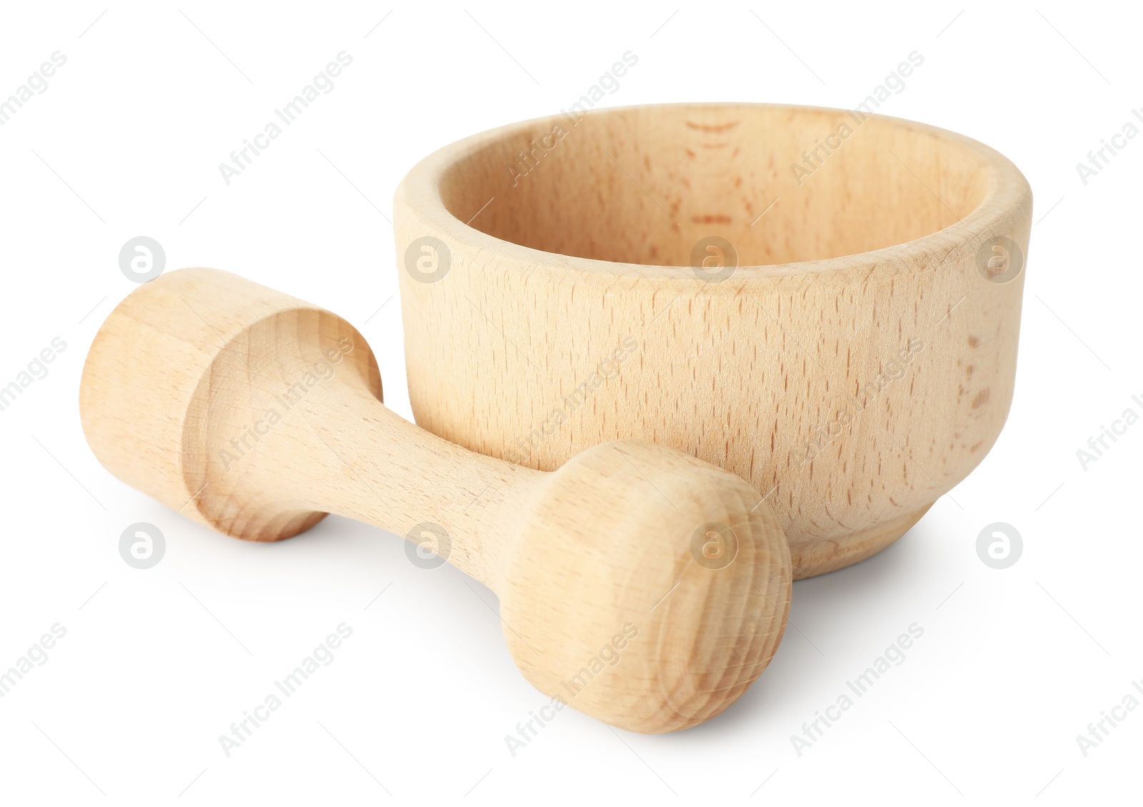 Wooden mortar with pestle isolated on white Photo of Wooden mortar with pestle isolated on white
