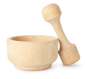Photo of Wooden mortar with pestle isolated on white