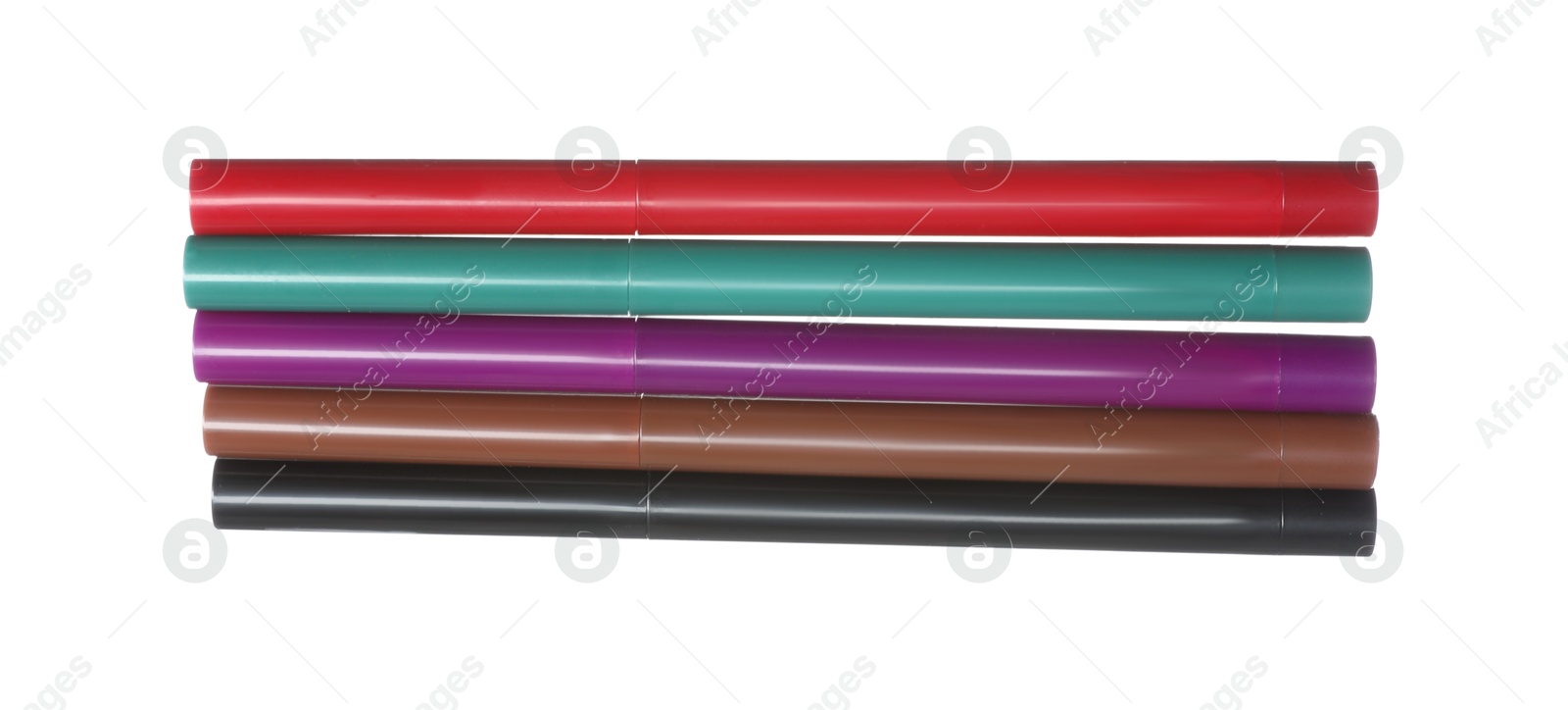 Bright twist up eye pencils isolated on white Photo of Bright twist up eye pencils isolated on white