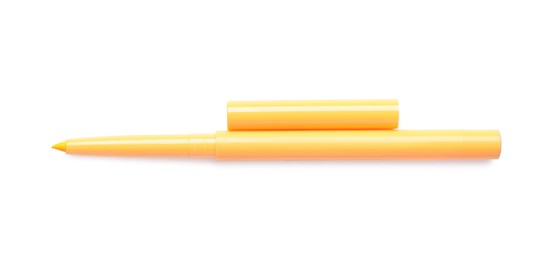 Photo of Yellow twist up eye pencil isolated on white, top view