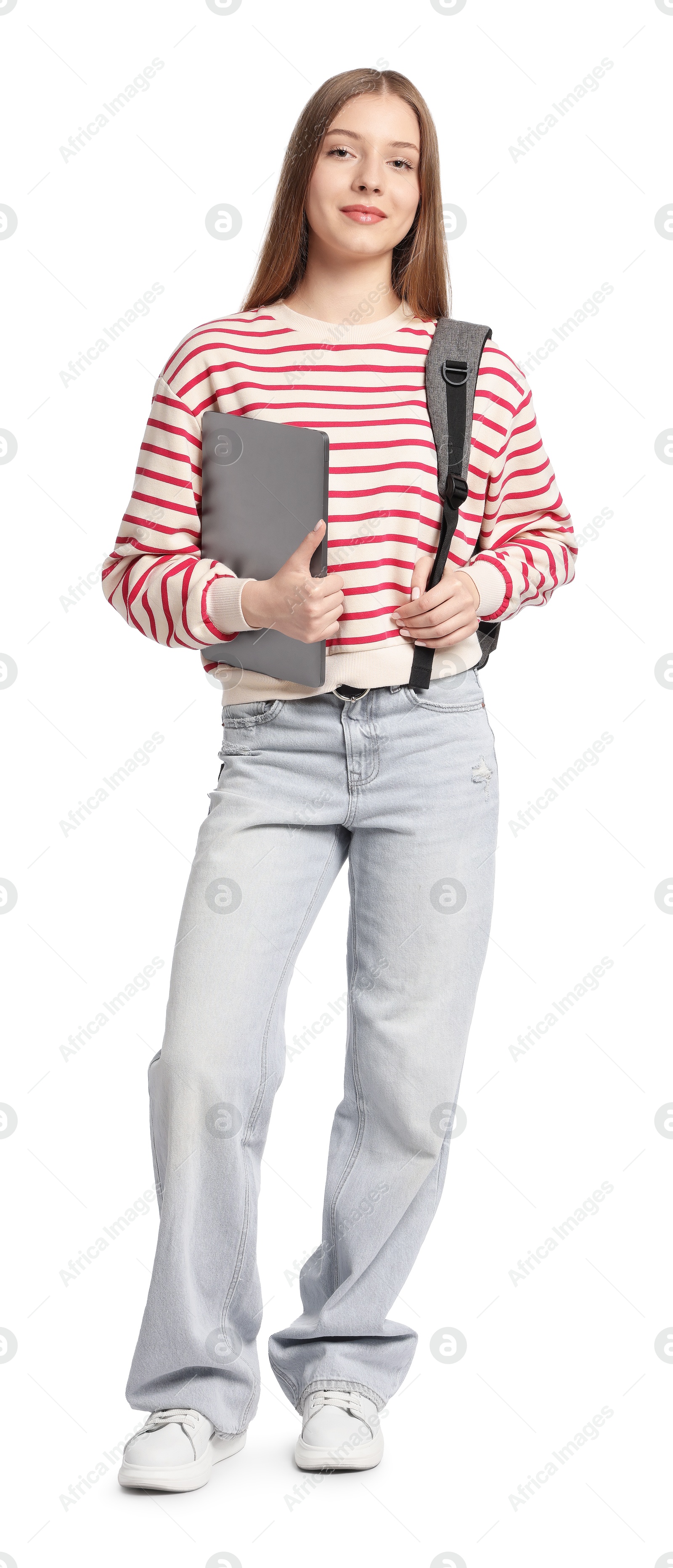 Teenage girl with laptop and backpack on white background Photo of Teenage girl with laptop and backpack on white background