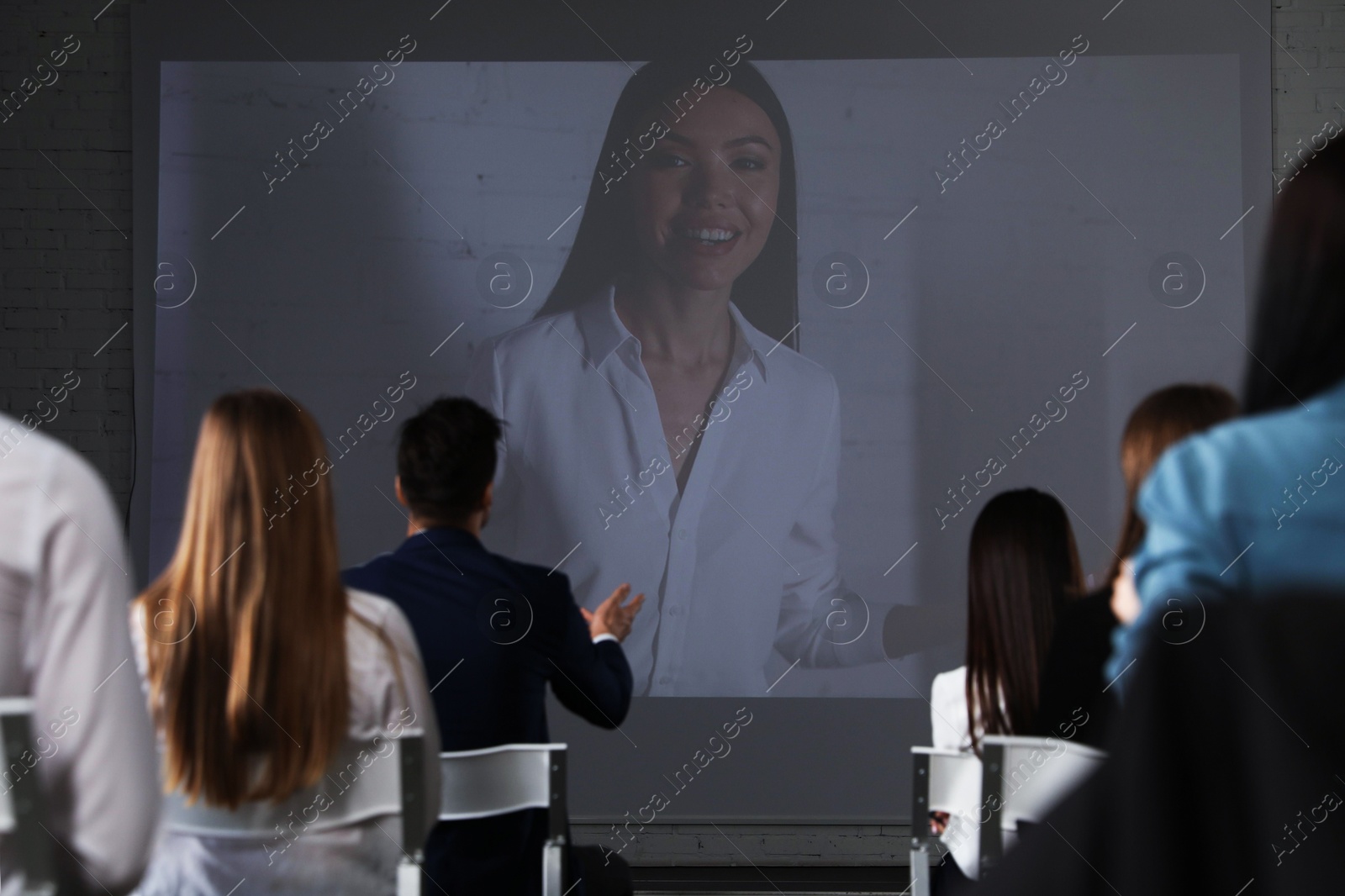 Video conference with female business trainer in office Photo of Video conference with female business trainer in office