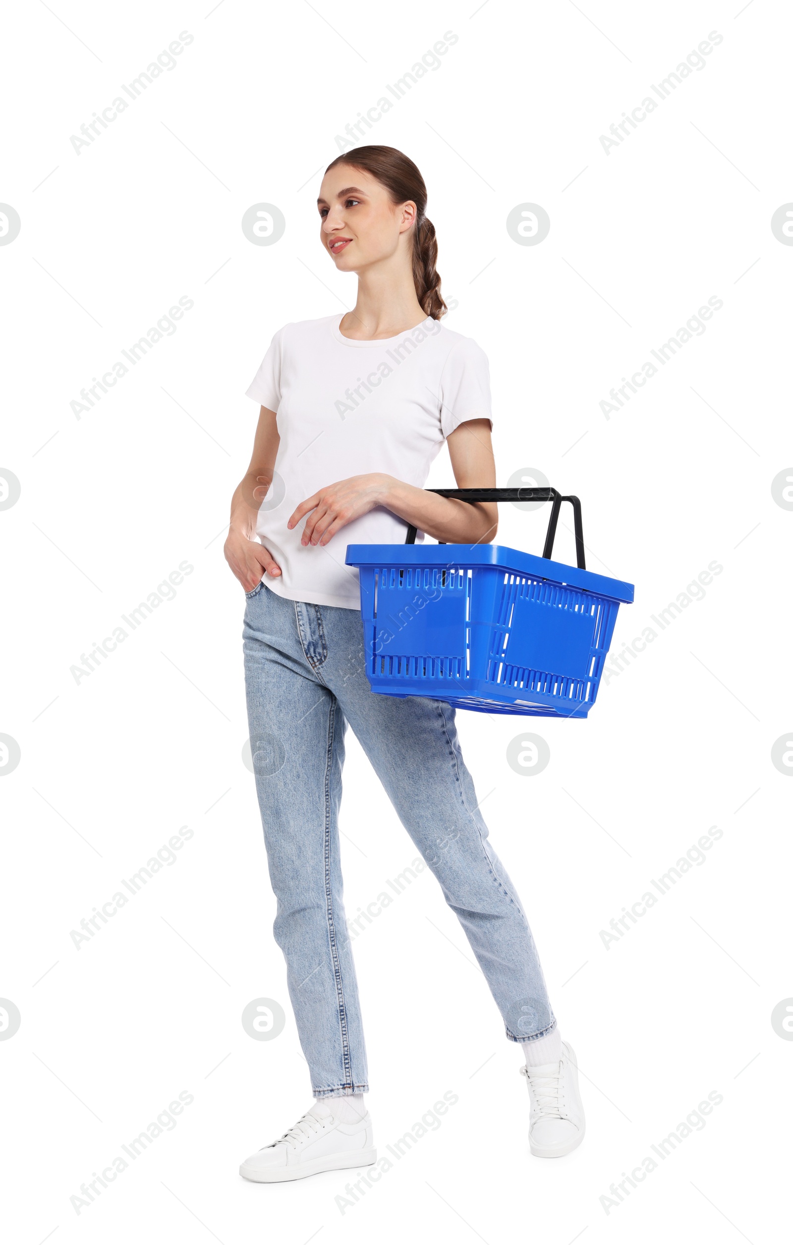 Woman with plastic shopping basket on white background Photo of Woman with plastic shopping basket on white background