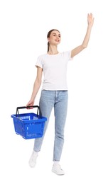 Photo of Woman with plastic shopping basket waving on white background