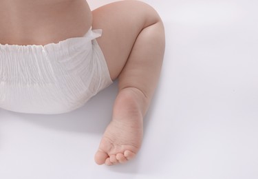 Photo of Cute little baby on white background, closeup
