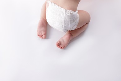Photo of Cute little baby on white background, closeup